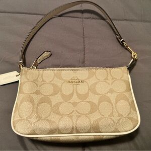 Coach Nolita 19 Beige In Signature Canvas Wristlet